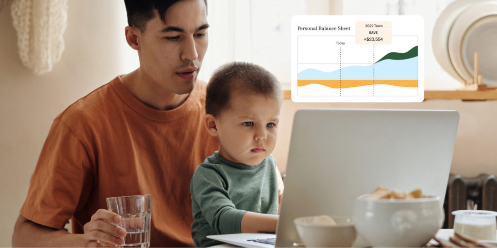 Desktop with employee and child looking at Harness Tools personal balance sheet tax savings